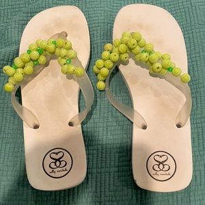 Tennis ball adorned flip flops